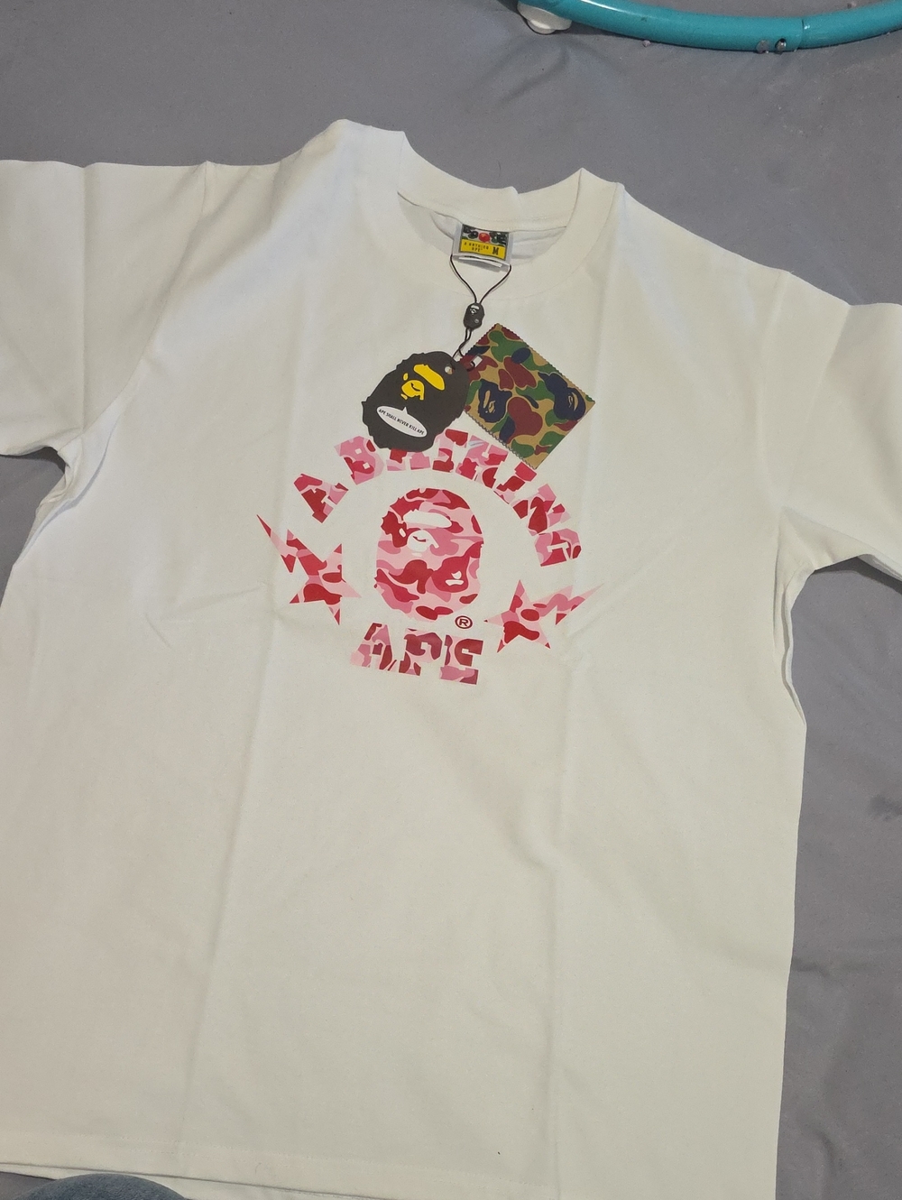 Bape White T-Shirt with Pink Camo Logo